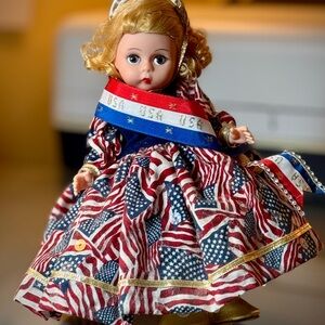 Madame Alexander Doll with Red, Blue, and Gold Dress